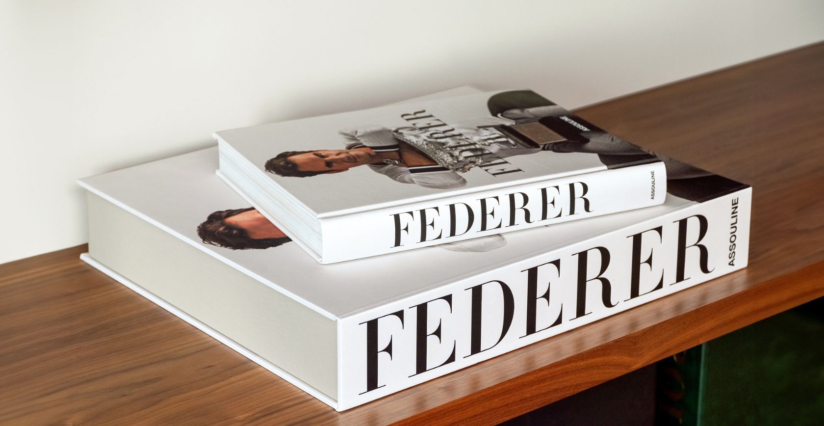 Assouline- Best Sellers; two Federer books on table